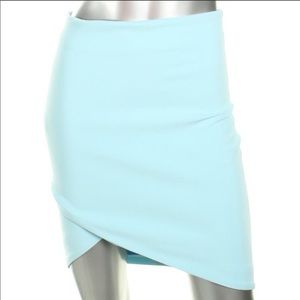 Likely light teal asymmetrical high waisted skirt